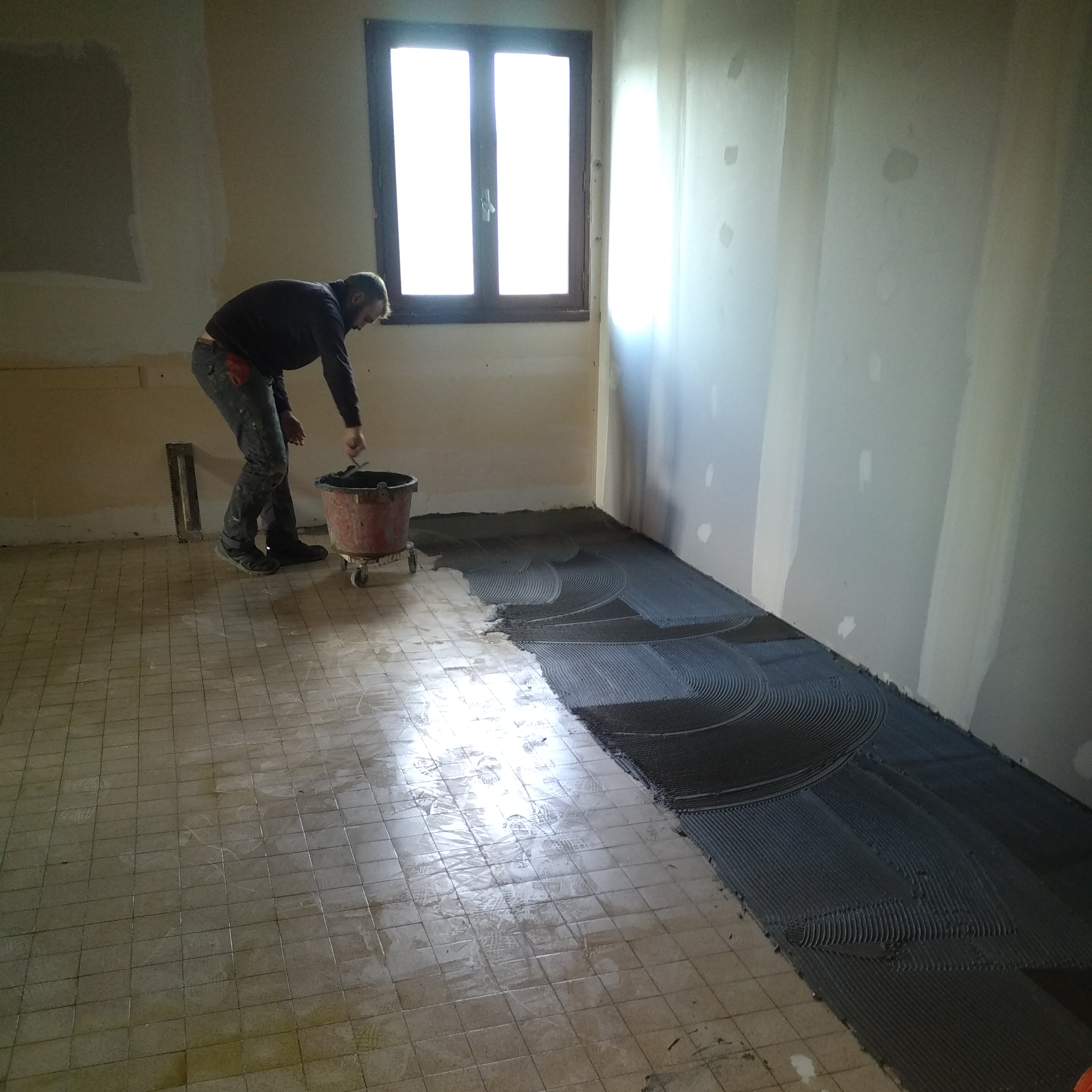 Réhabilitation espace public - rattrapage de sols et pose de carrelage